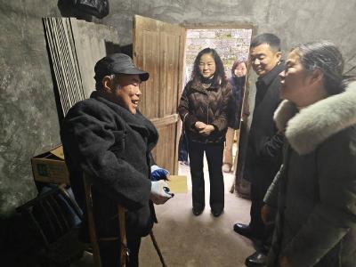 “助残暖冬”传温情 入户慰问暖民心