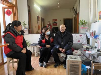 情暖向中 志愿驱寒冬