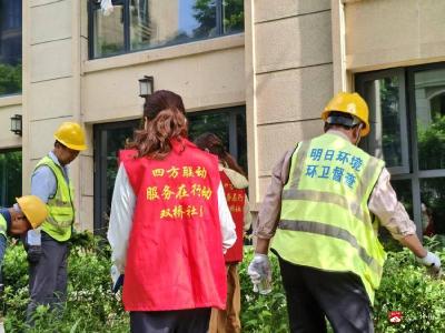 ​应山街道文明实践所：双桥社区联合环卫、园林开展畔山林语小区环境整治行动