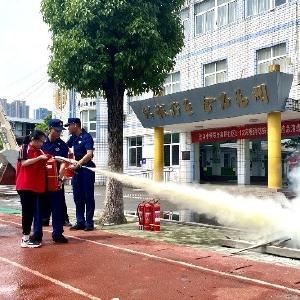 鑫桥社区联合金口小学开展消防安全演练