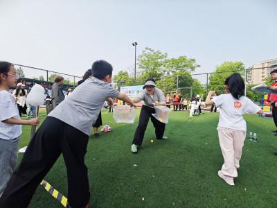 春日趣运动 减压乐融融——张家墩社区举办亲子趣味运动会