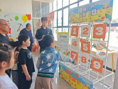 套圈甩锅钓好运，西湖社区“五一”活动玩出劳动新趣味