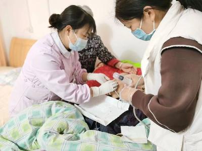 区人民医院延伸服务让出院患者更有“医”靠