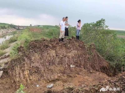 闻“汛”而动 “协”力出击 伙牌镇政协活动组在行动