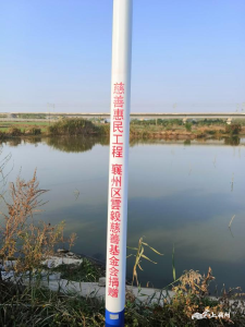 多方联动建路灯  照亮村民前行路