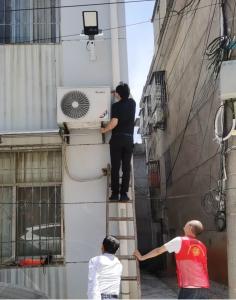 温泉社区：安装路灯解民忧 照亮居民回家路