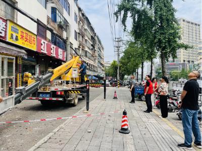 温泉社区：消除外墙脱落隐患 筑牢安全防护网络