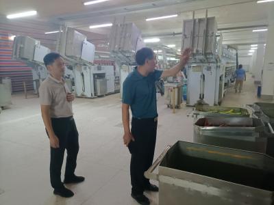 区人社局带领专家团队开展企业工伤预防指导