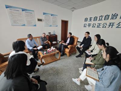 敲门问需听民意 俯身实干解民忧