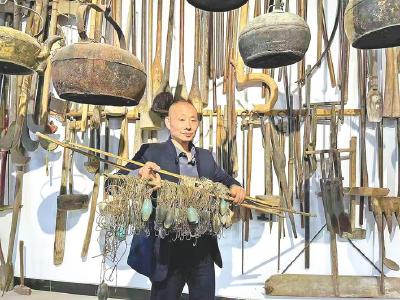 从捕鱼高手到护江宣传员  他把“滚钩”挂进自家博物馆