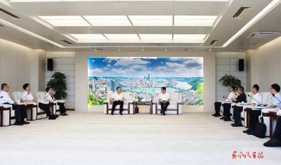 杨青与广西壮族自治区副主席、柳州市委书记谭丕创座谈交流